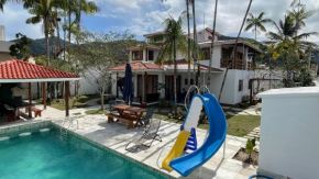 Chez Marguera em Juquehy - Luxo com muito espaço, conforto e lazer - incluso roupas de cama e banho, diarista, serviço praia, piscina aquecida, maquina gelo, cervejeira, karaoke - PET friendly